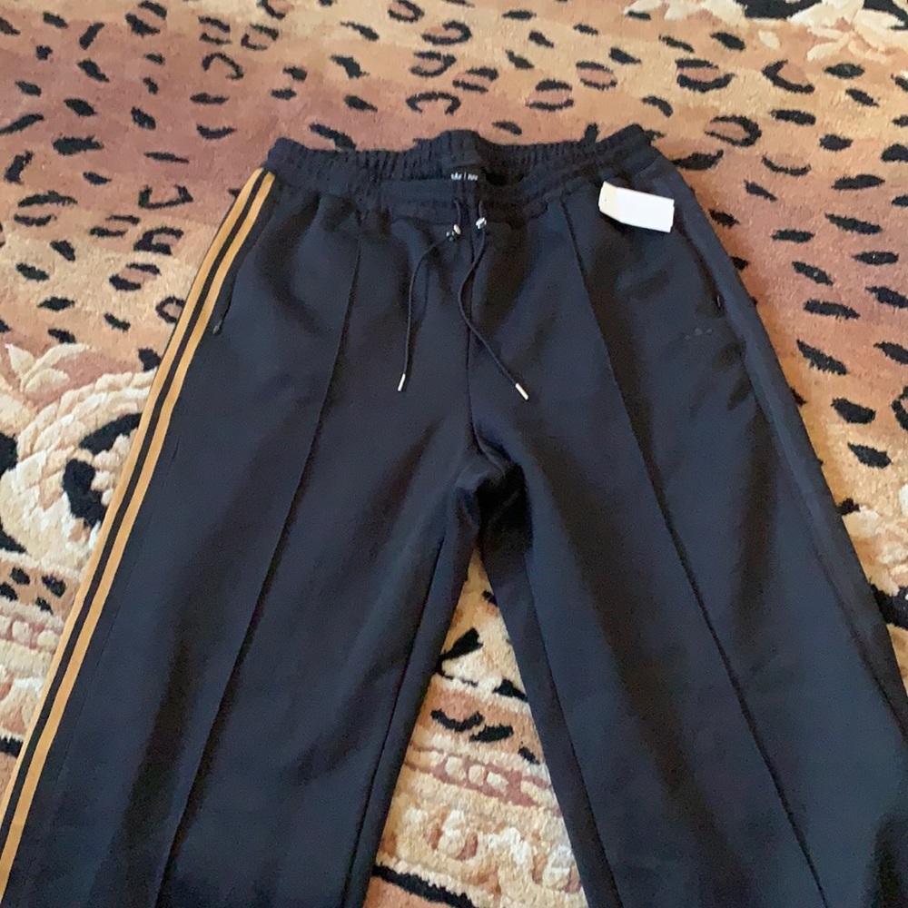 Adidas originals track pants. Copper trim size 1x